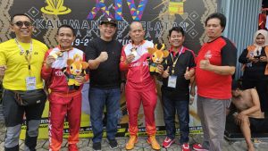 Sumardjo dan Admiral Heppy Raih Emas Bulitangkis